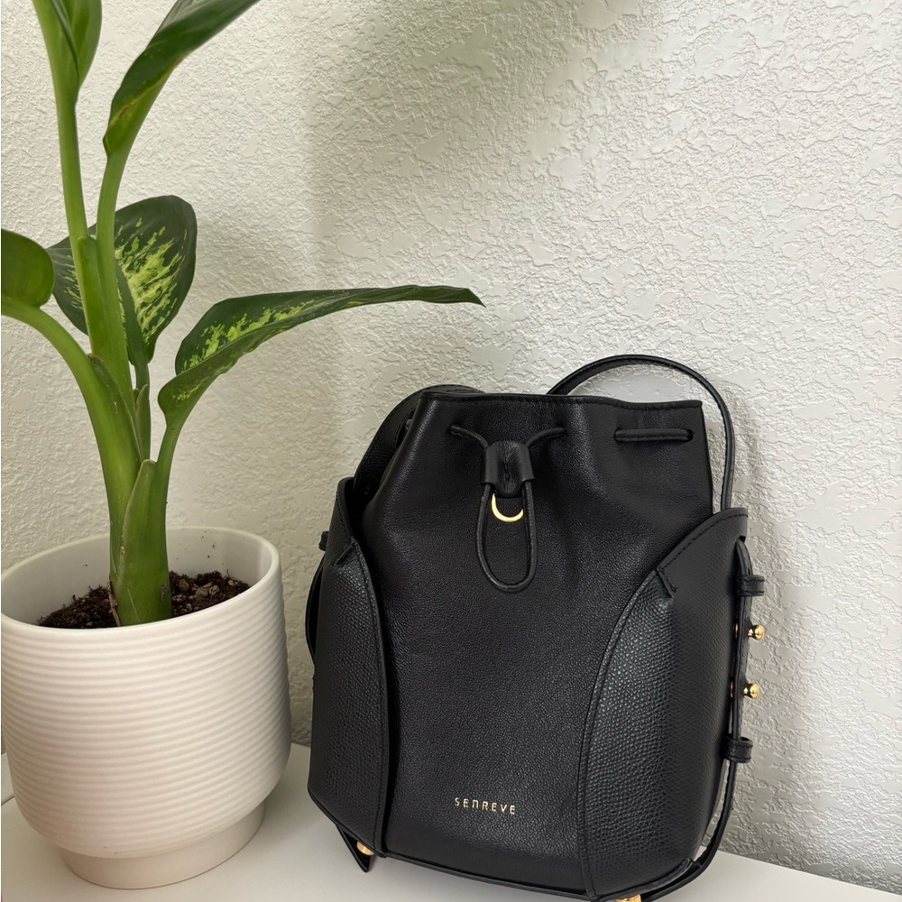 Senreve Black Crossbody Bag with Sleek Design and Versatile Style